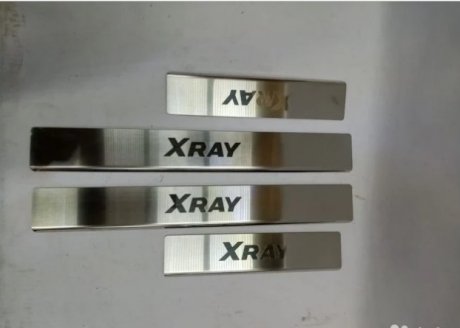 Комплект накладок на пороги с именем модели Xray. Xray Cross ВАЗ 99999215004200 (фото 1)